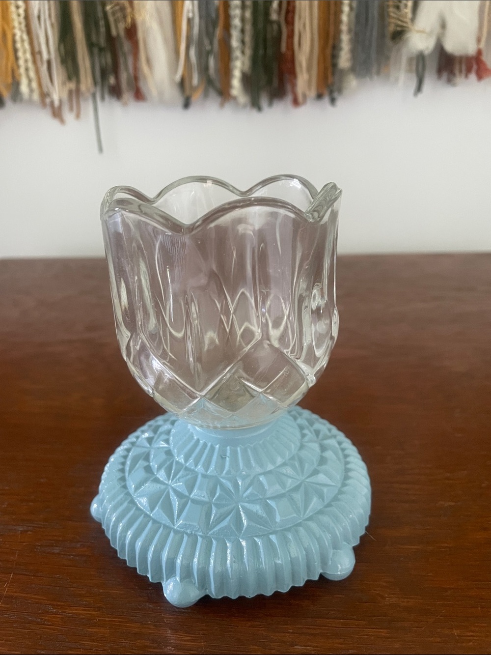 Blue glass base with clear tulip votive candle holder